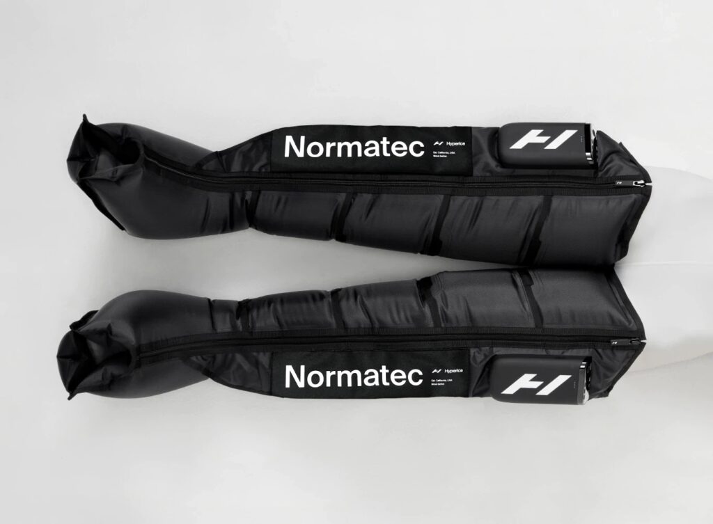 Portable Normatec Premier compression therapy system, leg attachment available for hire in the UK, perfect for sports recovery, improving circulation, and flushing toxins faster than standard massage for athletes and fitness recovery seekers.